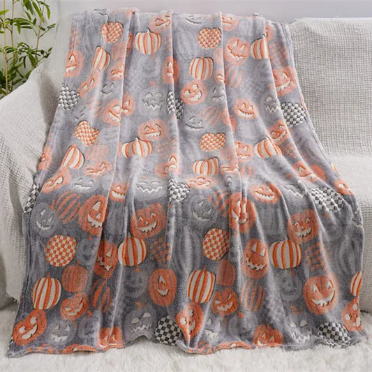 Cartoon-style flannel blanket for children shown as an air conditioner cover and bed throw.