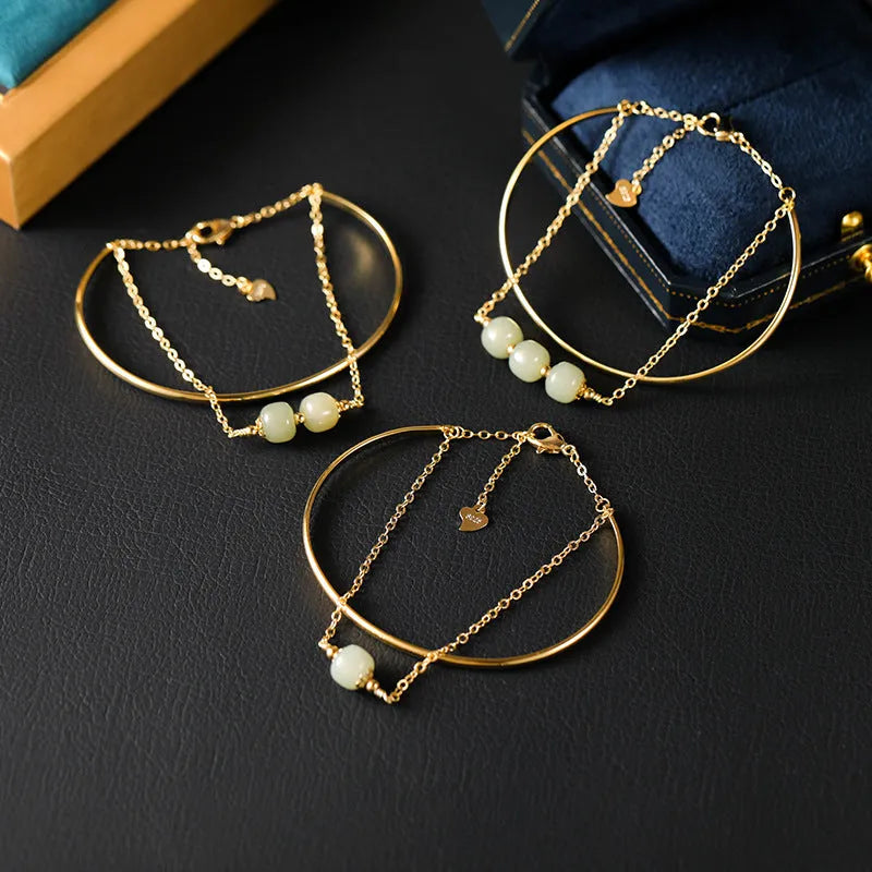 Women's jade lucky beads bracelet with gold inlay, showing single, double, and three bead version options.