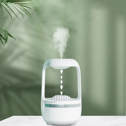 Black and white anti-gravity humidifier with floating water drops and large 500ml water tank.
