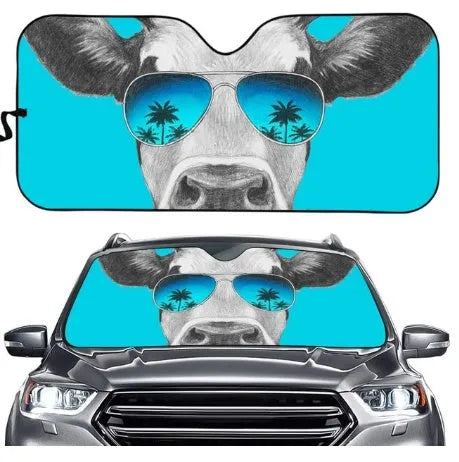 Telescopic aluminium foil car sun visor extended on a car windshield
