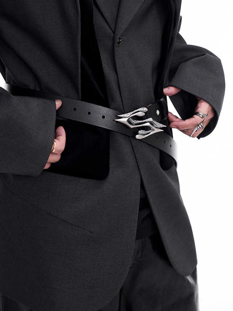 Black men's leather belt with metal letter detail showing two-layer cowhide construction