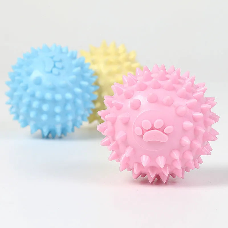 Blue TPR pet chewing ball with footprint texture and tooth-cleaning ridges measuring 6cm diameter