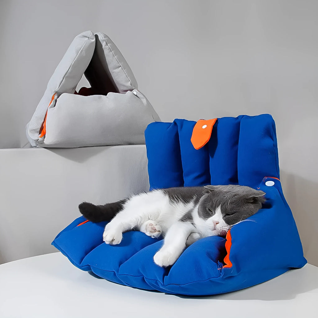 Blue triangular cat bed with drilled holes for modular combination and removable cotton cover