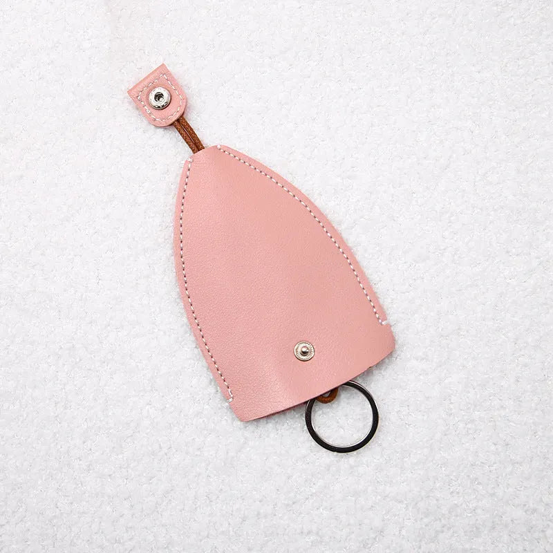 Colourful cartoon pull-out key case made from PU leather showing design options