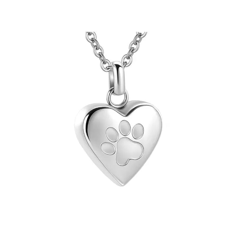 Openable heart-shaped titanium steel cinerary necklace for ashes in silver, gold, or rose gold.