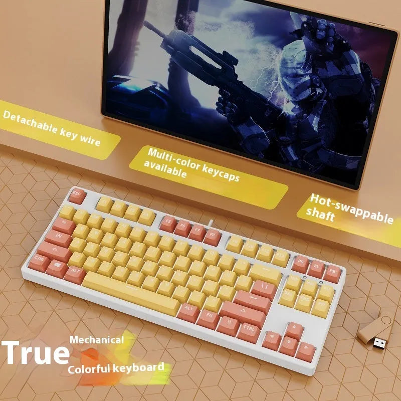 87-key wired mechanical gaming keyboard with multi-colour keycaps on a metal body.
