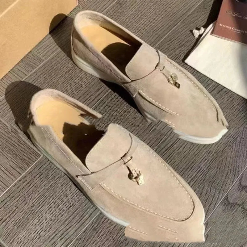 Unisex slip-on casual loafers with rubber soles in various colours on a white background.