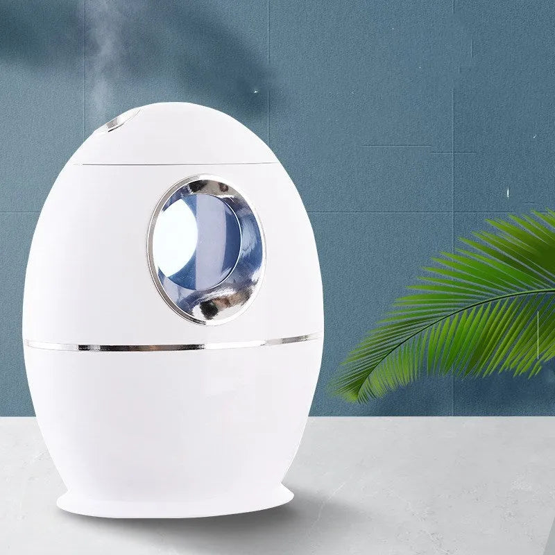 White columnar air humidifier unit with a single mist outlet and a USB cable.