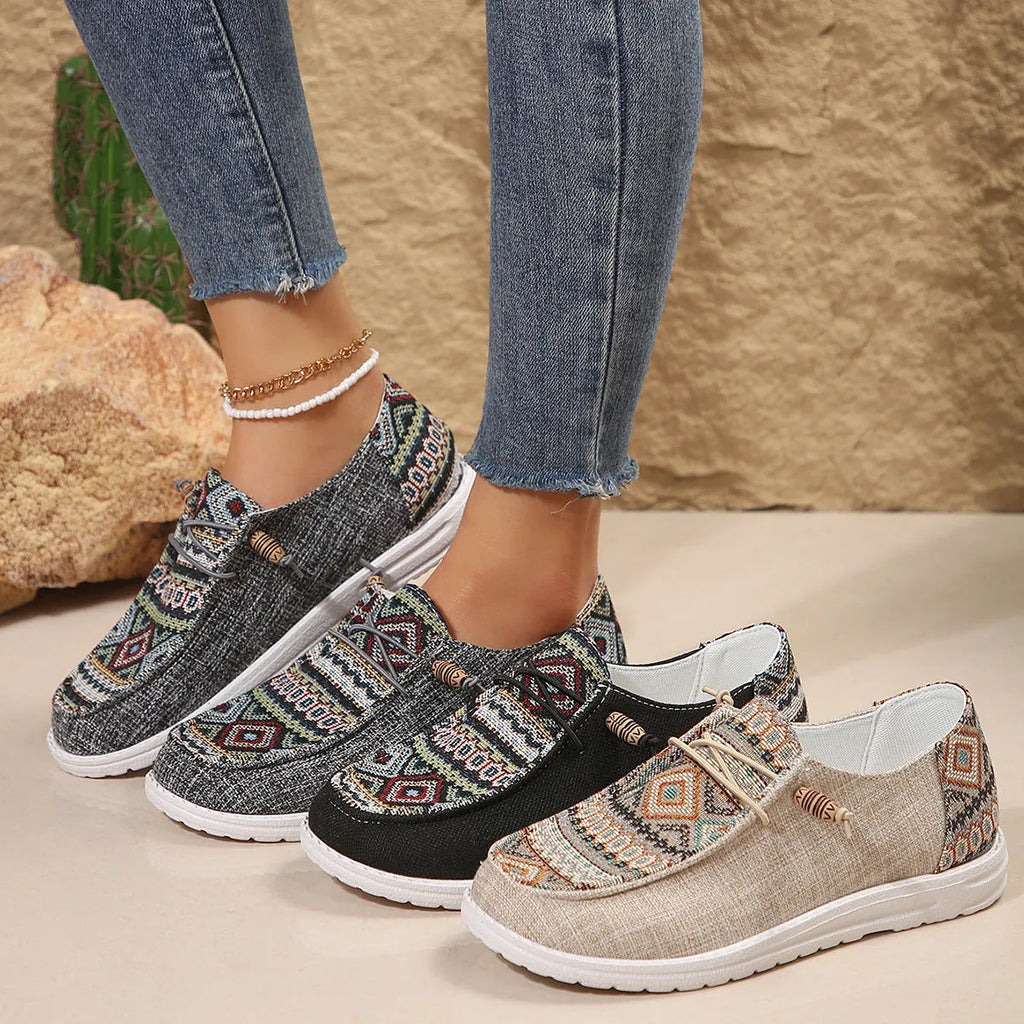 Women's black flat round toe low-top shoes with artificial PU upper and rubber sole.