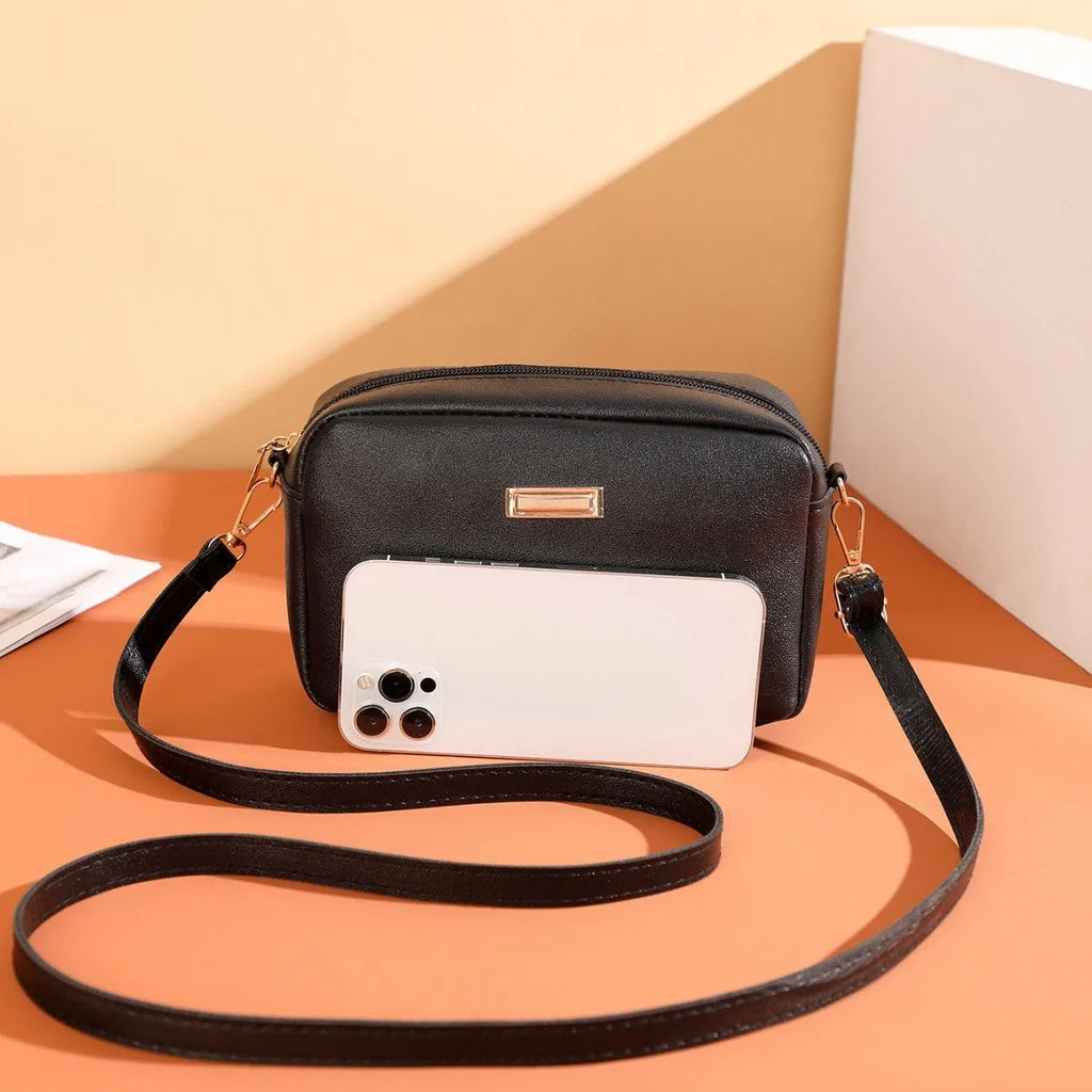 Women's solid colour PU shoulder bag with three-dimensional pockets and square suitcase shape