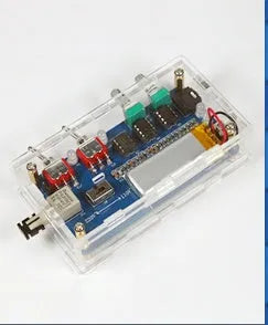 Music Tesla coil driver board with controller and cables on a workspace, showing arc discharge diagram.