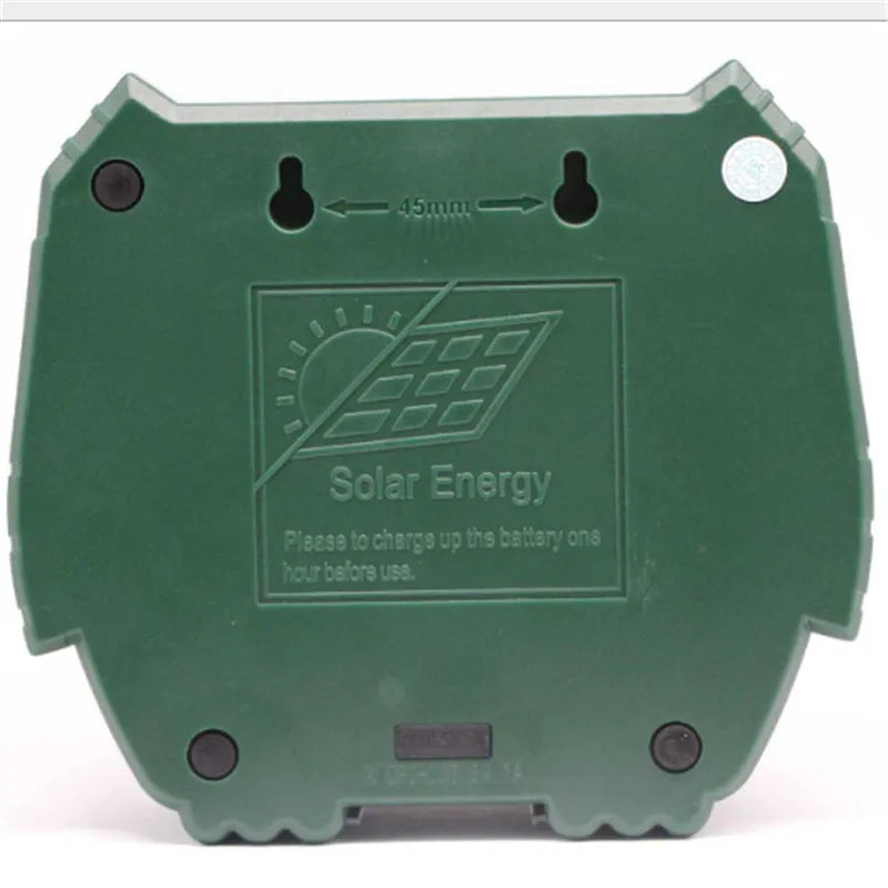 Green solar-powered ultrasonic animal repeller with motion sensor for outdoor pest control.
