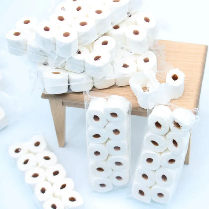 Simulated paper tissue roll model measuring 30x15x80mm for children's pretend play