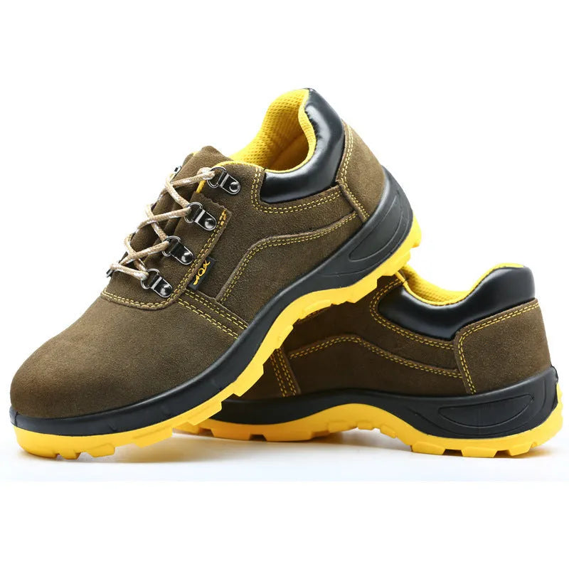 Bronze coloured low-cut cow suede safety work boots with a steel toe cap on a grey background