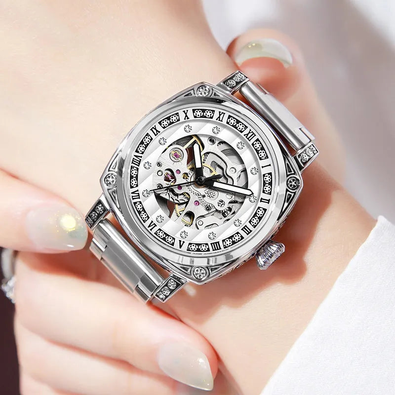 Leather strap mechanical watch with luminous hands showing black dial option
