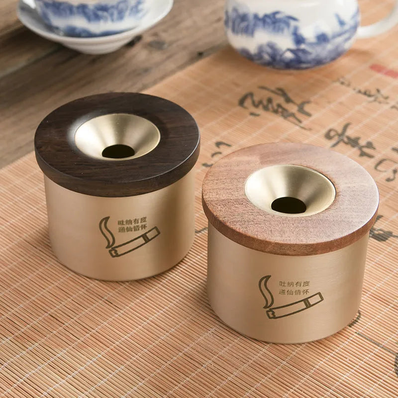 Solid copper retro ashtray with a wooden lid in black or rosewood, showing central air hole.