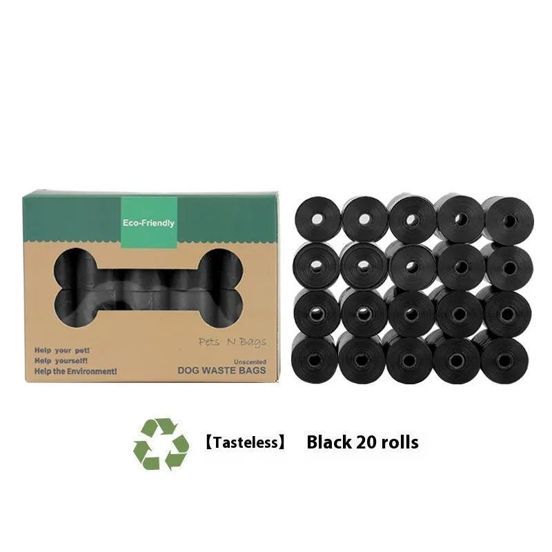 Roll of green EPI degradable pet garbage bags next to a boxed set with a dispenser.