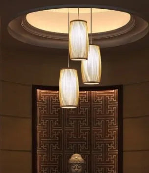 Natural bamboo plait wall lamp with woven design and E27 bulb holder