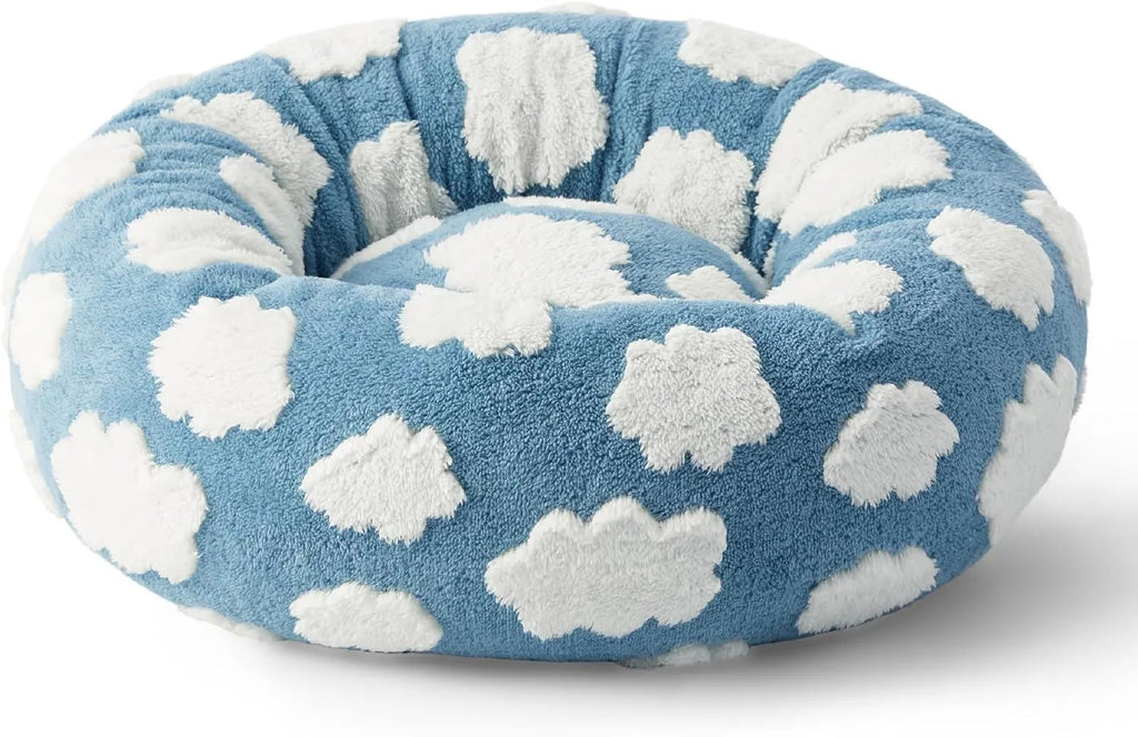 Round plaid dog bed on a plastic base, shown in sea blue and white check pattern.