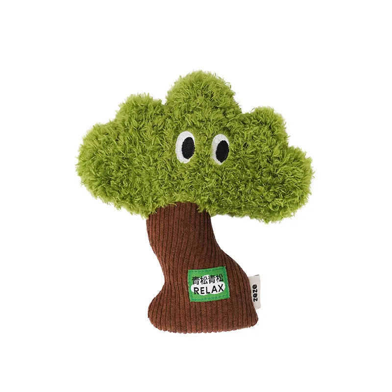 Pine tree-shaped hanging cat chew toy with mint filling, shown next to a ruler for scale