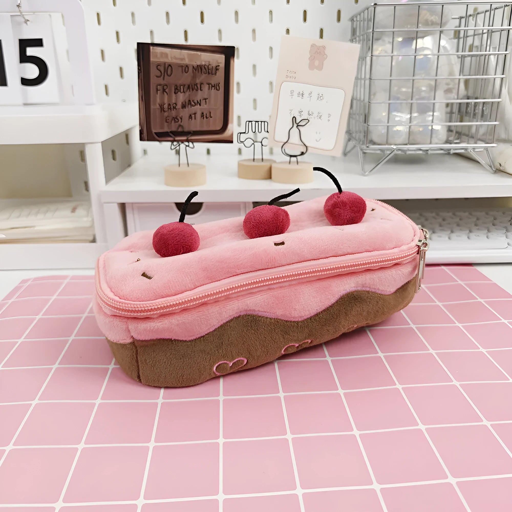 Korean style velvet pencil case with red and pink cherry cake plush design.