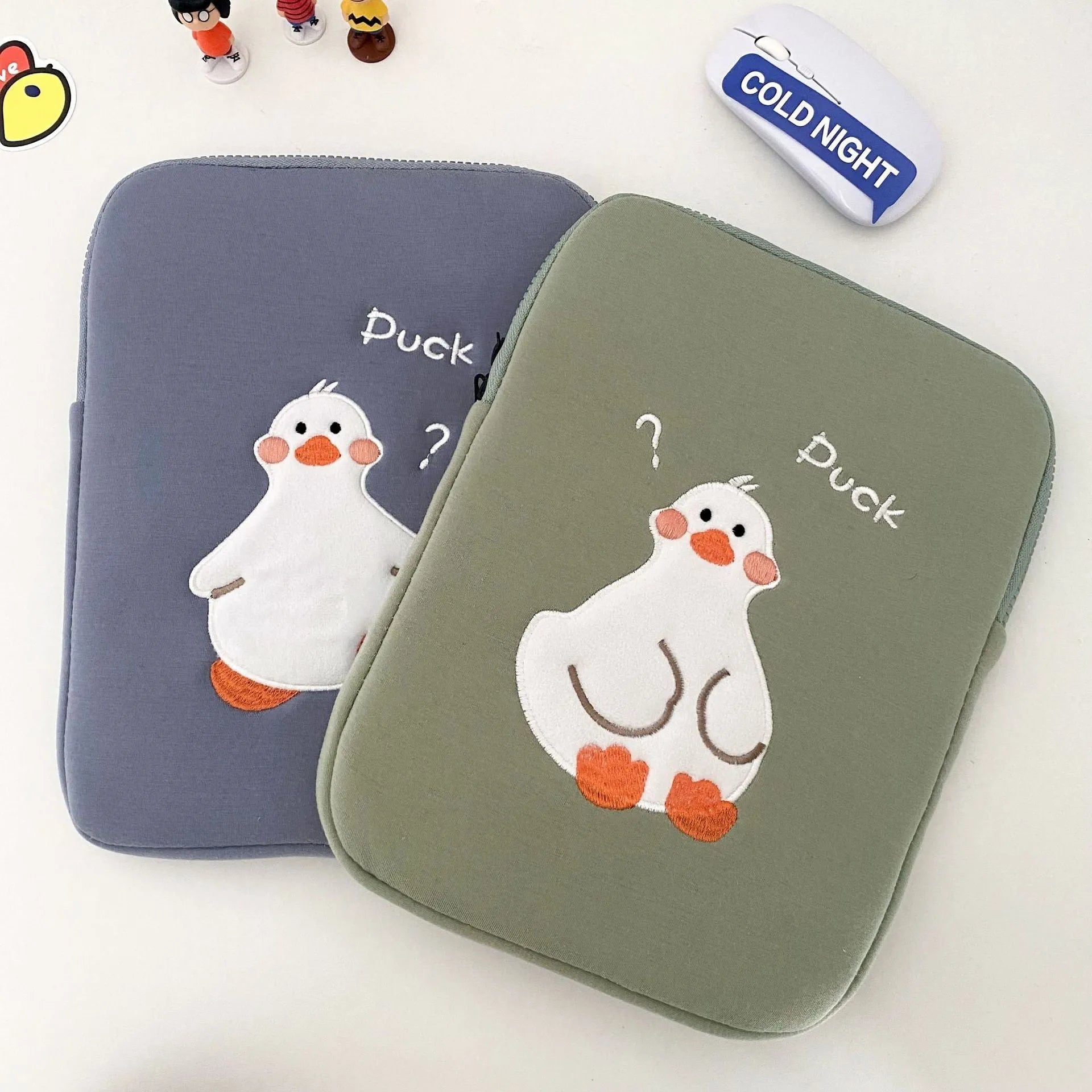 Blue cotton tablet case with cartoon duck embroidery design and zipper closure