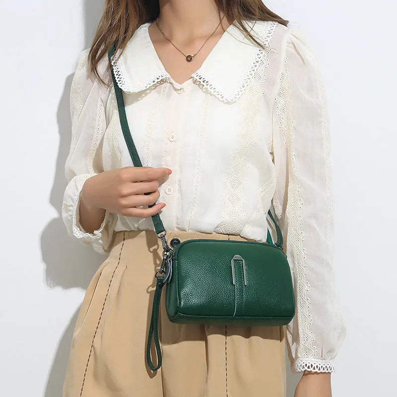 Women's genuine leather square shoulder bag in black with first layer cowhide construction measuring 19x13x6cm