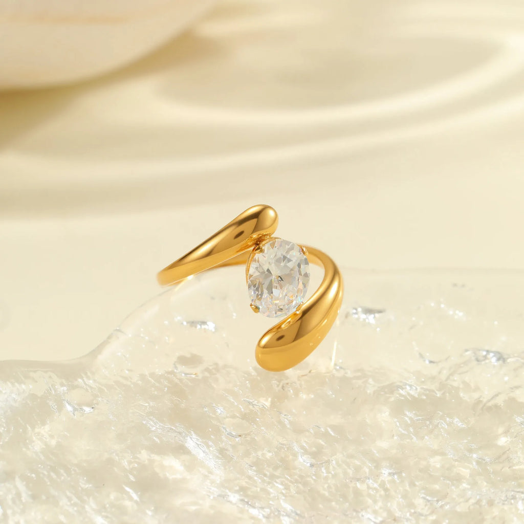 Geometric stainless steel zircon ring with open mouth adjustable design on a hand.