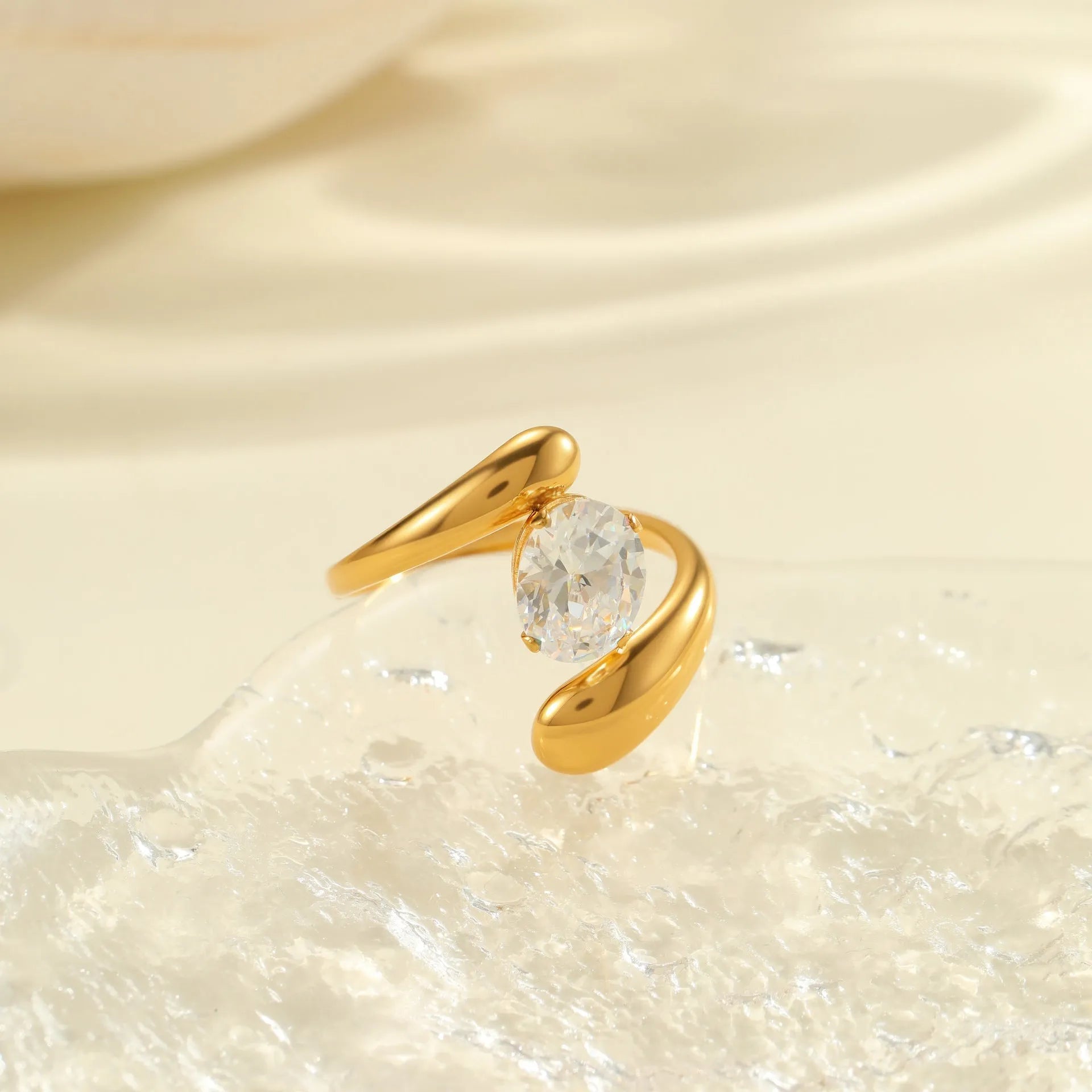 Geometric stainless steel zircon ring with open mouth adjustable design on a hand.