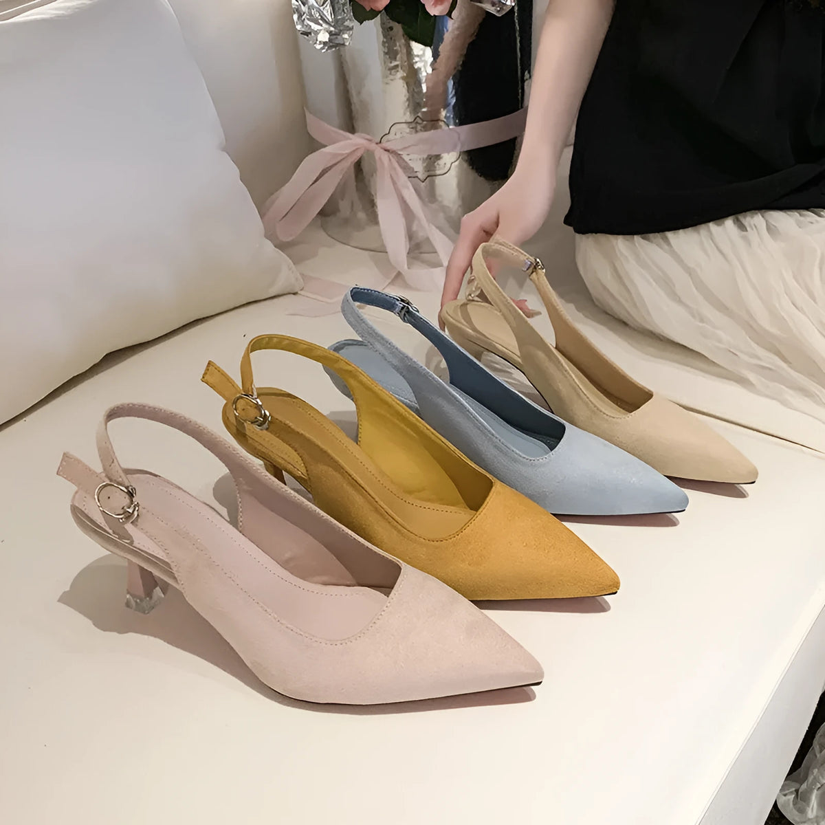 Women's apricot suede pointed toe stiletto heels on white background