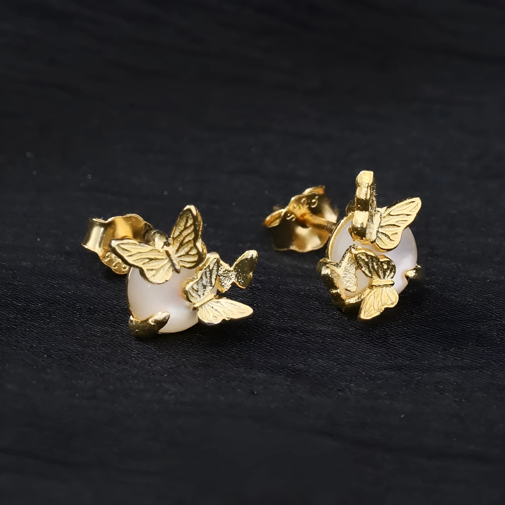 Butterfly ear studs in 925 sterling silver with electroplated white gold or gold colour finish