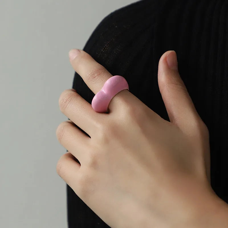 Three-dimensional heart-shaped enamel ring in a choice of colours on a zinc alloy band.