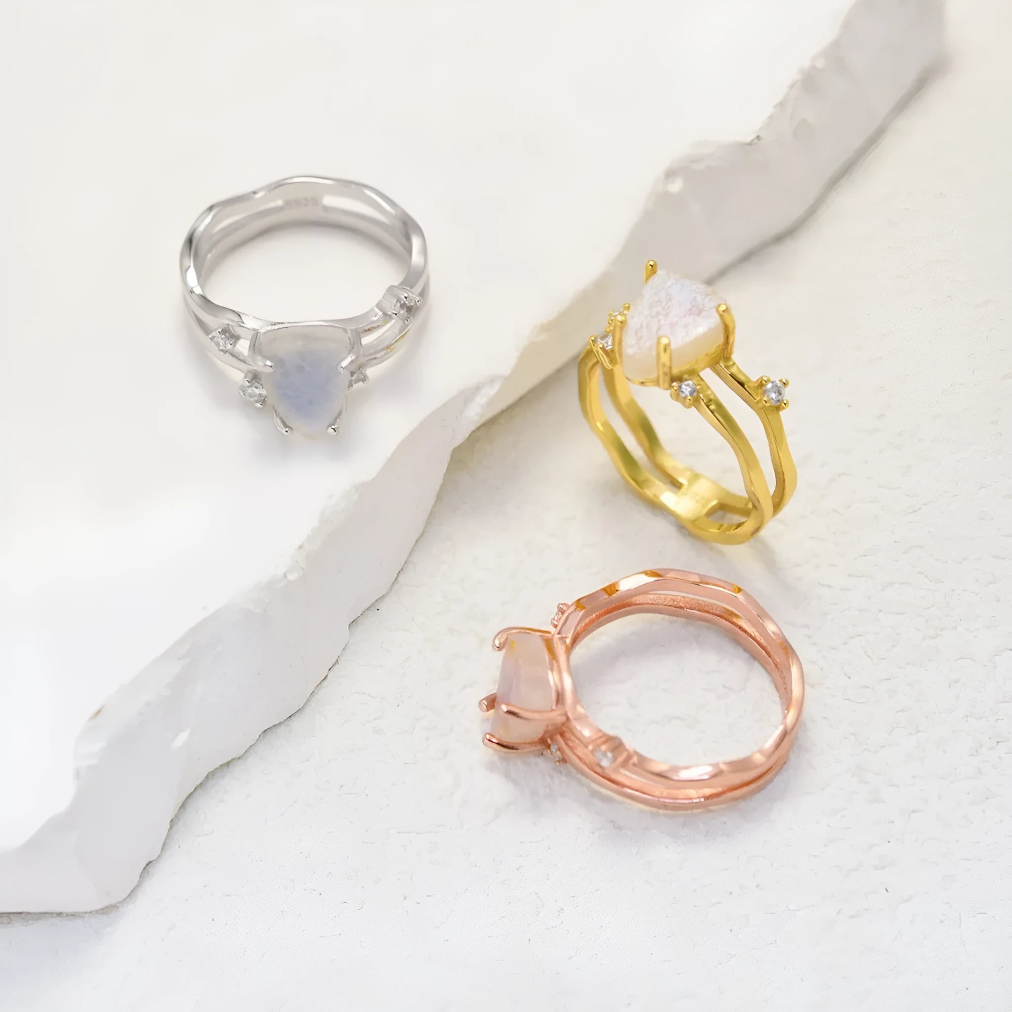 S925 sterling silver moonstone ring with geometric triangle shape on jewellery display