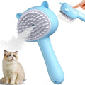 Blue cat steam brush with rubber bristles and ergonomic handle for pet grooming