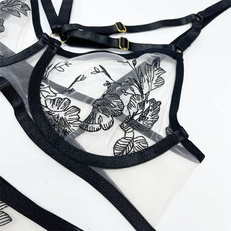 Women's black lace mesh three-piece set with floral print showing top, pants and waist ring