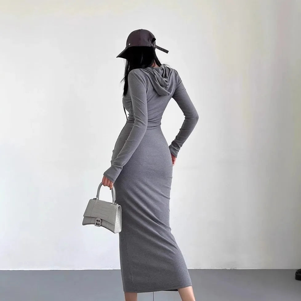 Women's grey hooded long sleeve sheath dress with a high waist and knee-length skirt.