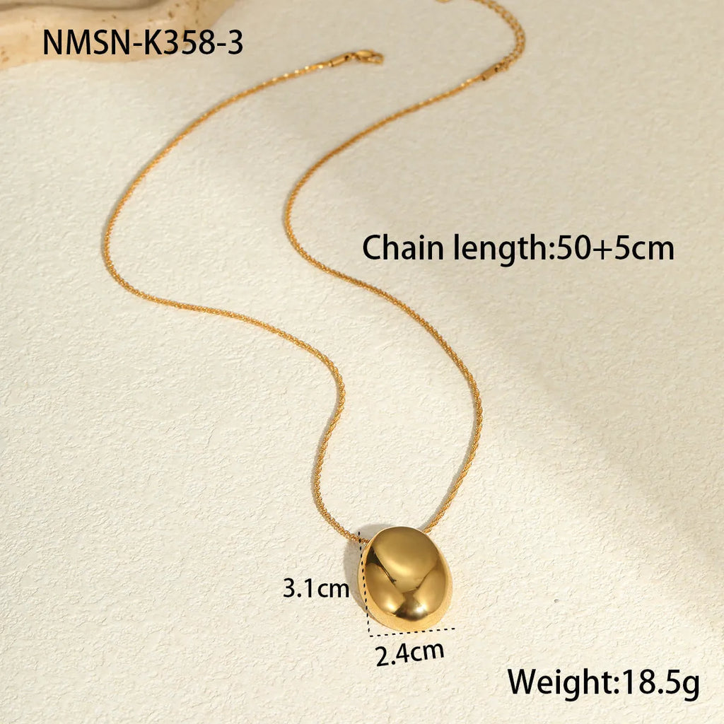 Gold geometric pendant necklace with 41-50cm chain on stainless steel background