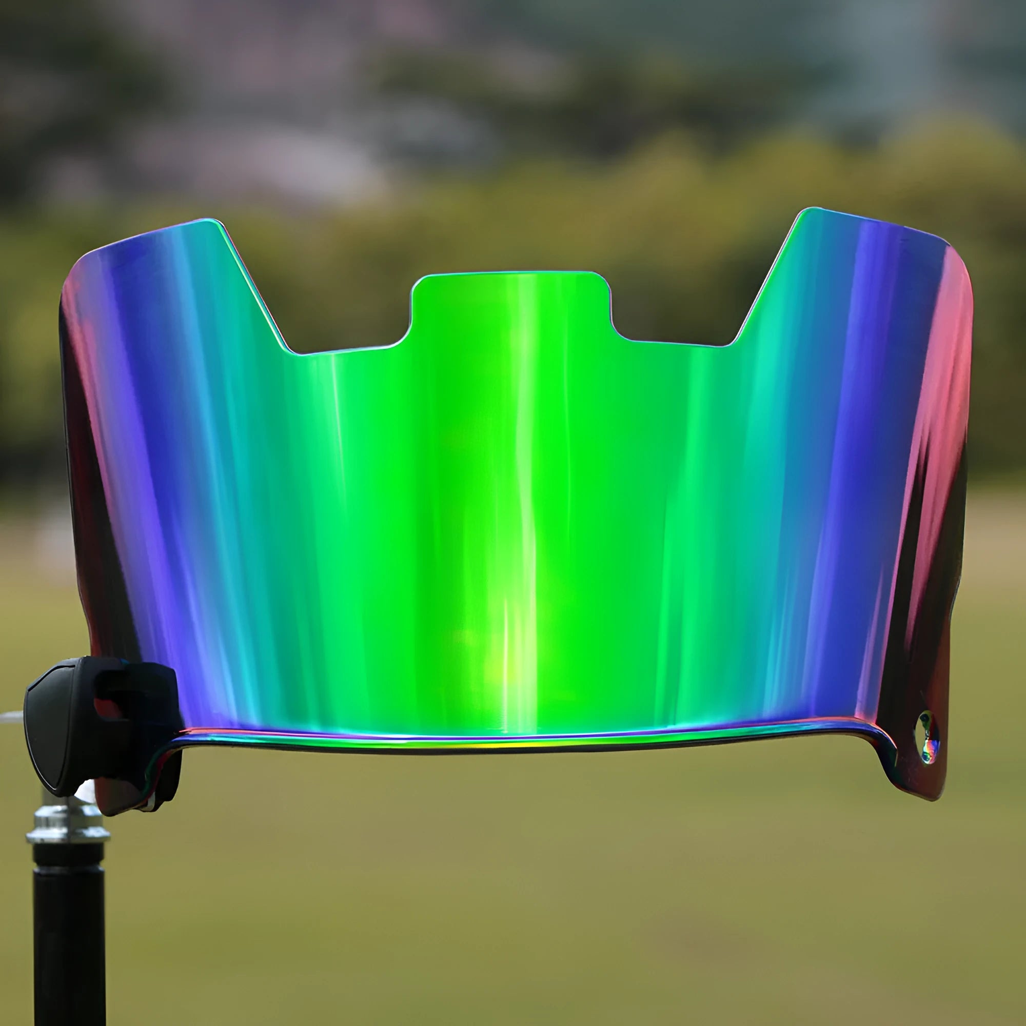 Multicolour American-style rugby helmet goggles shown attached to a helmet for impact protection.