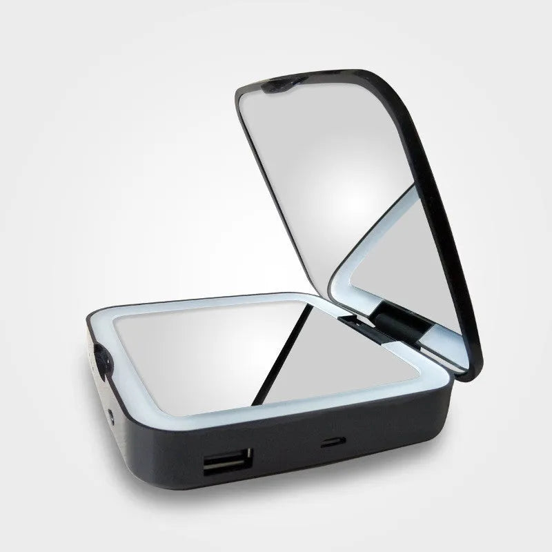 Black and white dual-sided makeup mirror with 4x magnification and HD sides, showing adjustable light settings.