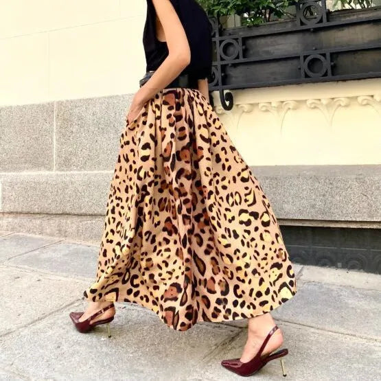 Brown leopard print women's A-line skirt with a long length and big flowing hem.