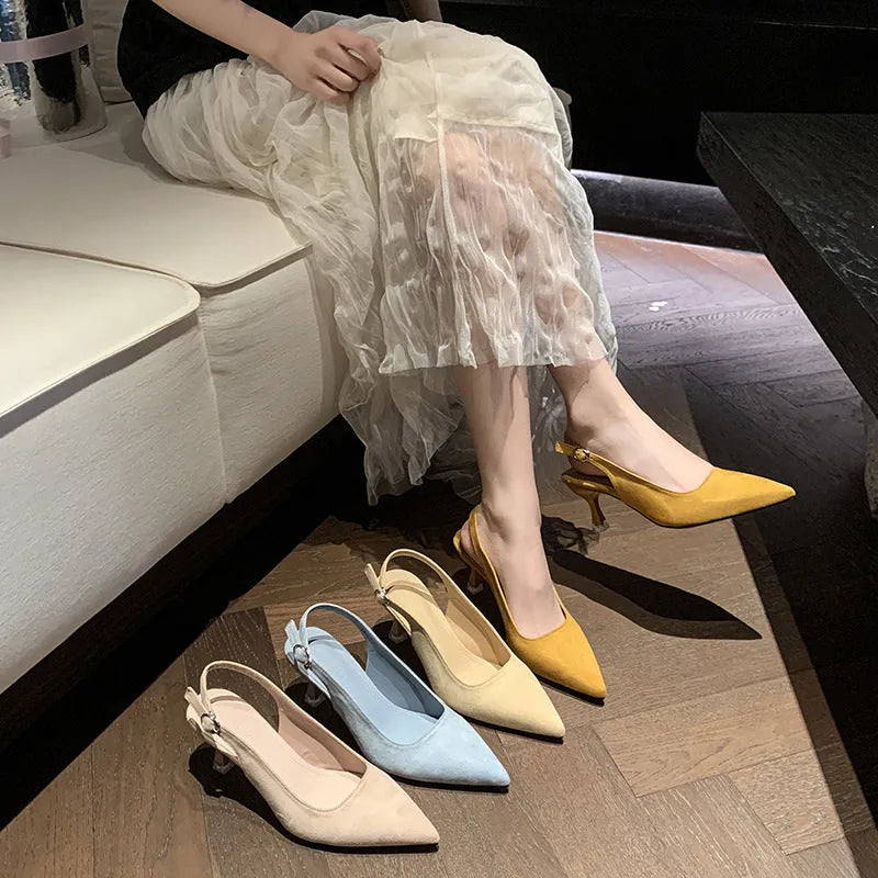 Women's apricot suede pointed toe stiletto heels on white background