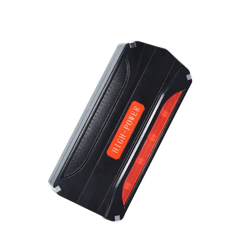 Black and red vehicle emergency jump starter with 7800mAh battery capacity showing connection clamps