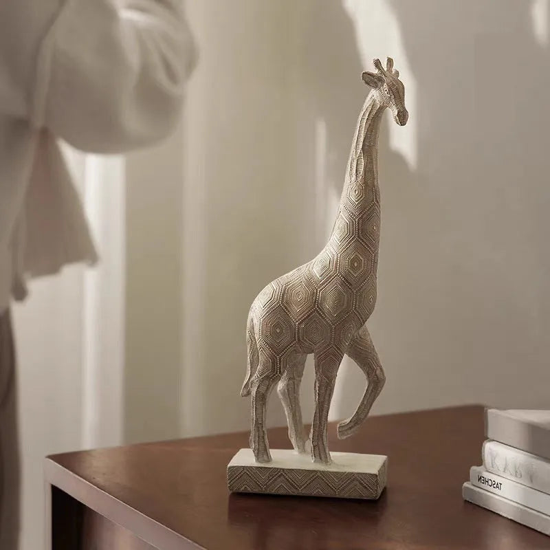 Wood colour synthetic resin giraffe ornament in European style on a shelf.