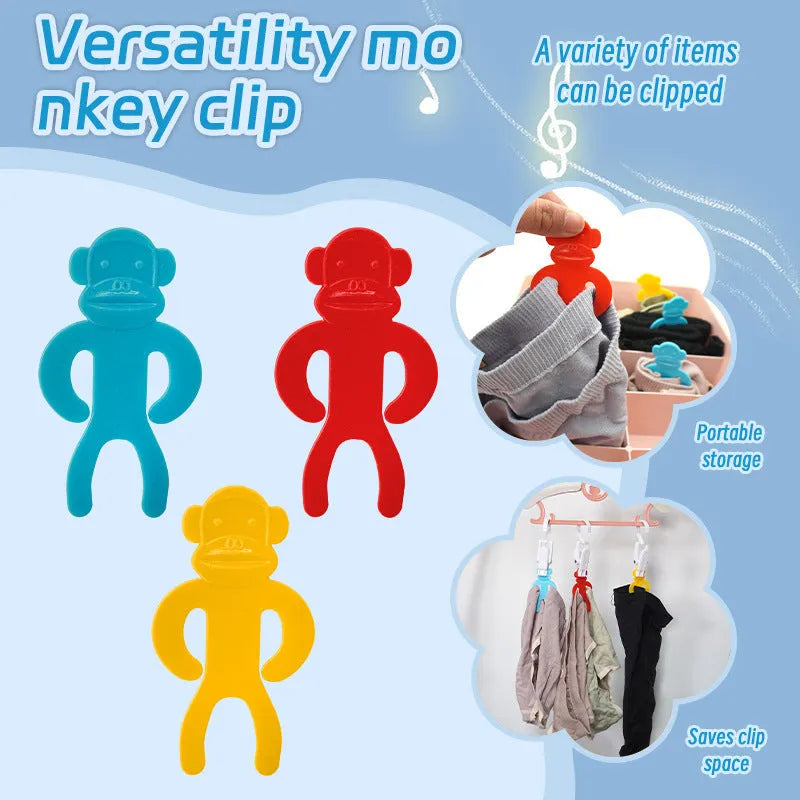 Plastic socks storage clips in blue, yellow, and red colours for keeping pairs together during machine washing