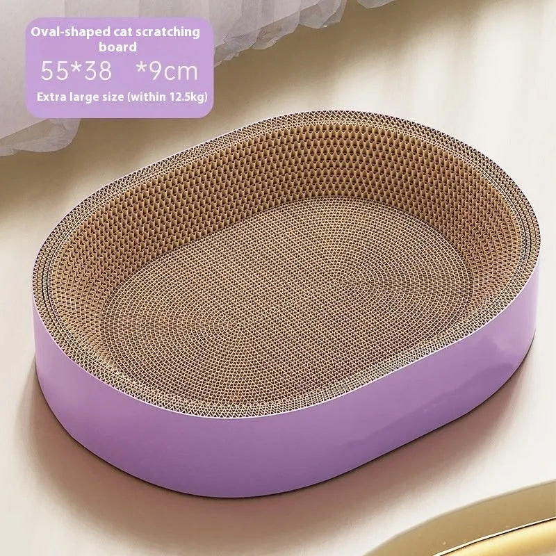 Green oval corrugated paper cat nest with scratch board surface measuring 55 cm diameter