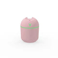 Round desktop humidifier with USB cable in ivory white, sky blue, or pink colour options