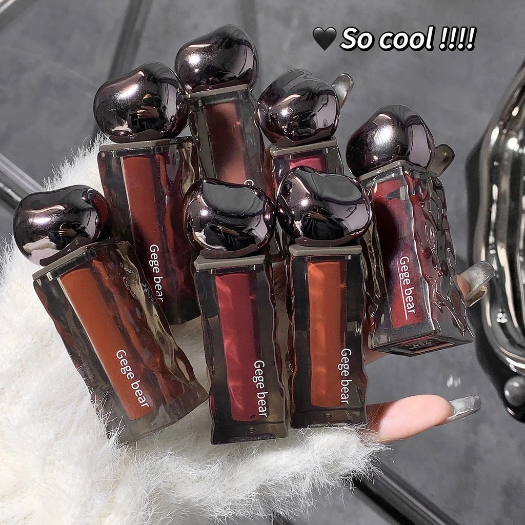 Glacier Lava Lip Lacquer tube in water light mirror finish with seven colour number options displayed.