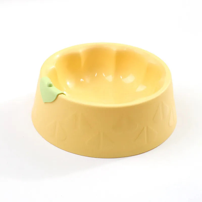 Green plastic double bowl for dog and cat food and water with anti-tip base.