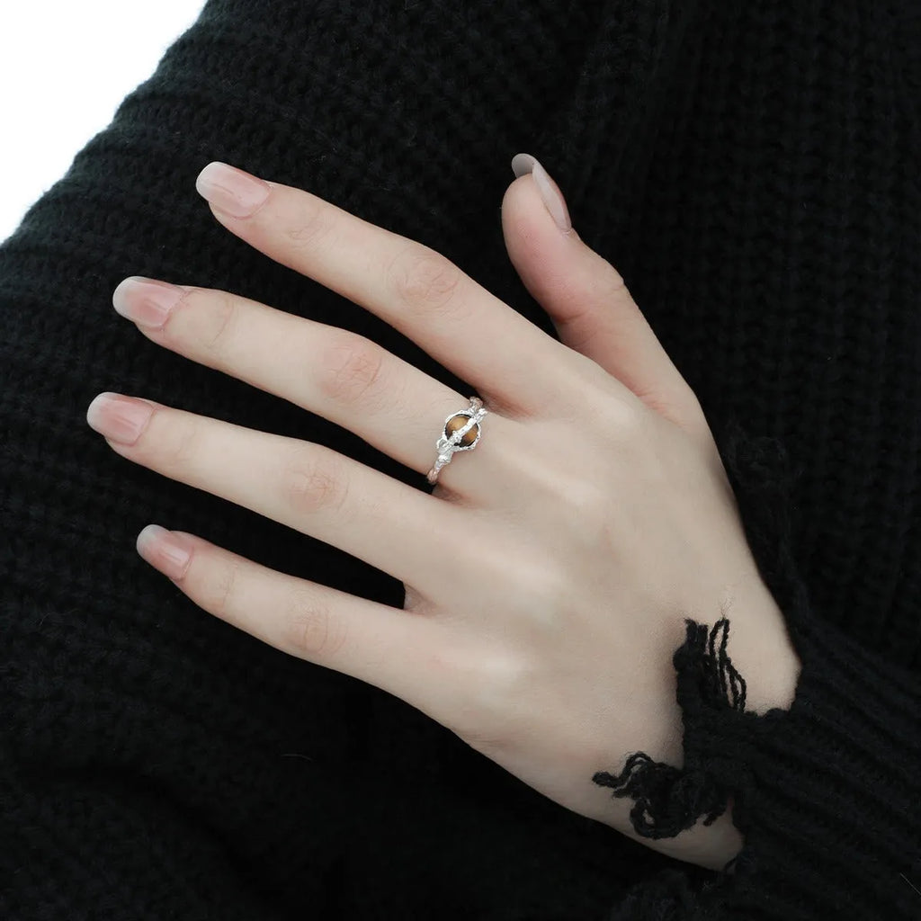 Adjustable opening women's ring with Saturn design in white gold colour electroplated silver