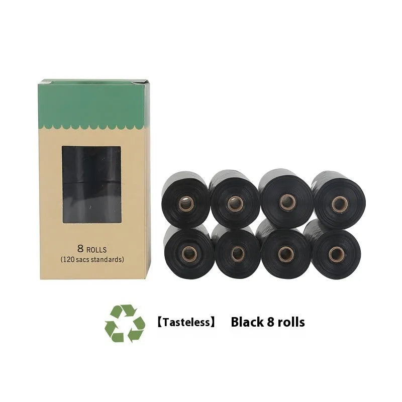 Roll of green EPI degradable pet garbage bags next to a boxed set with a dispenser.